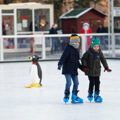 Children Outdoor Skating in Winter